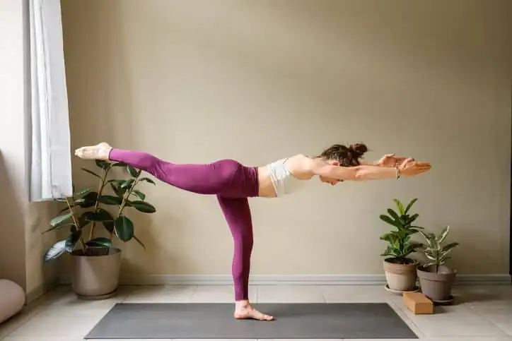 Woman doing Yoga exercise  to help with toning the body. 