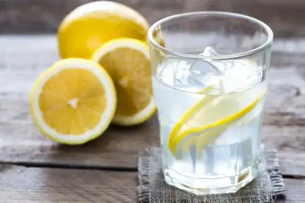 Hydration: The Secret Ingredient for a Toned Stomach and Enhanced Fitness 2 Image of lemon water to aid hydration